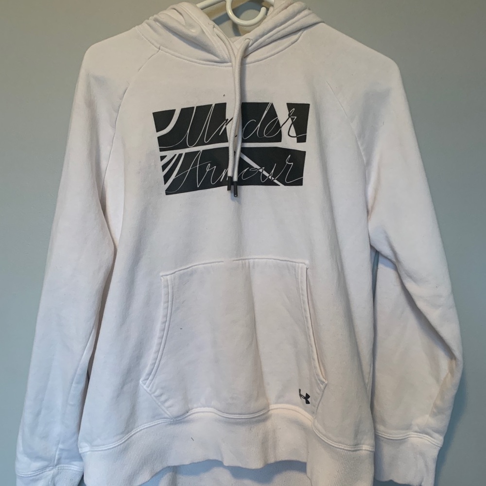 Under Armour white sweatshirt.